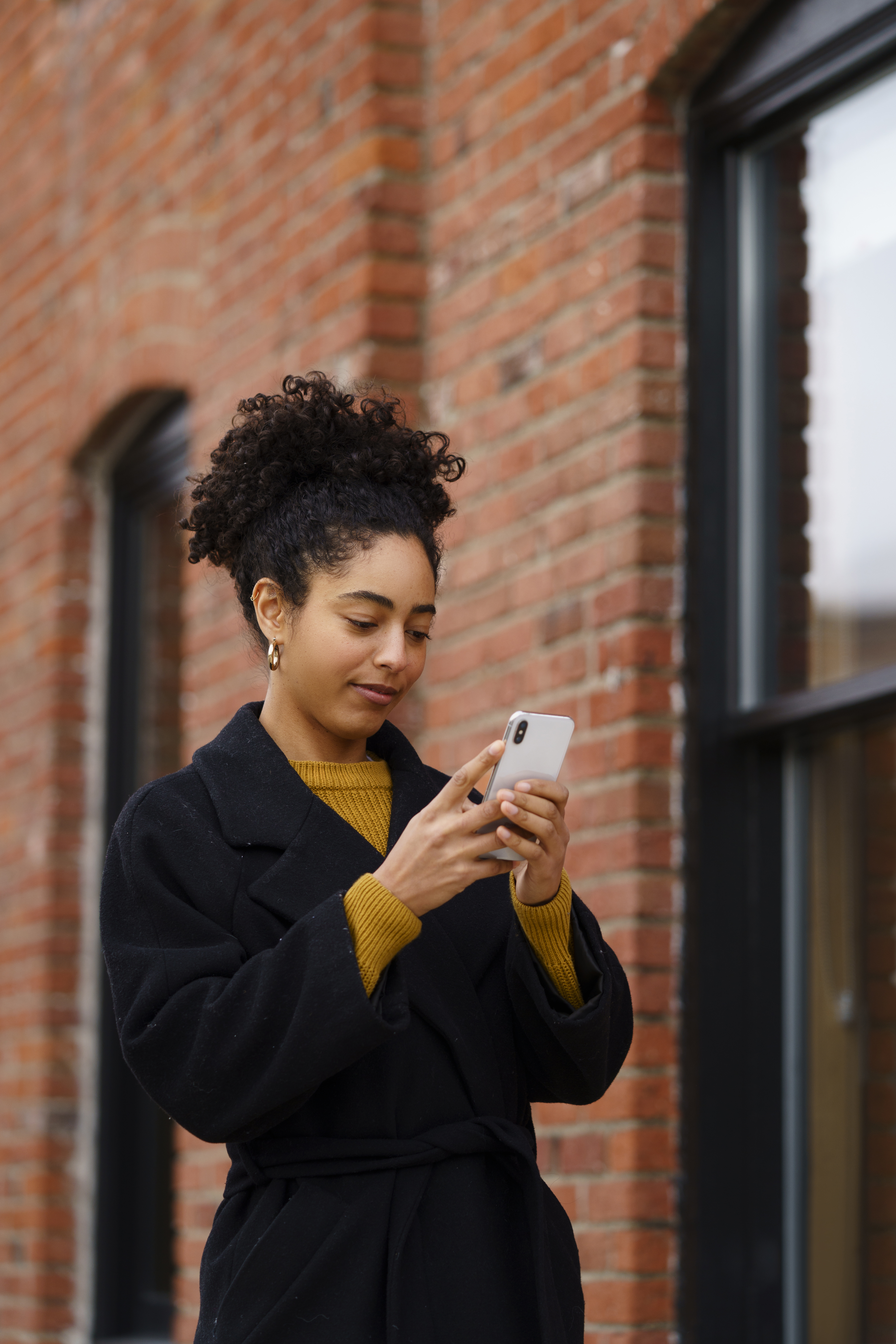 Woman easily booking a walk on her smartphone.